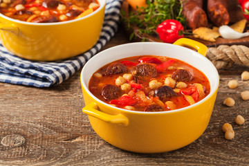 Traditional chickpea soup with paprika and chorizo sausage.