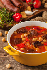 Traditional chickpea soup with paprika and chorizo sausage.