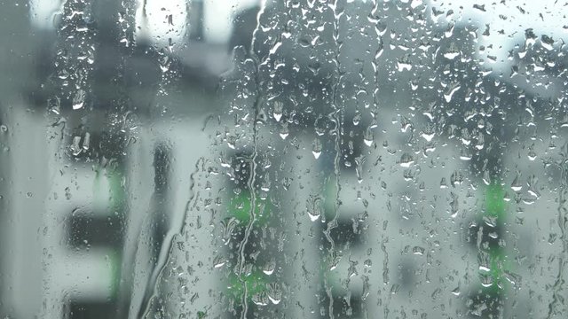 Windowpane during a heavy rain, a background