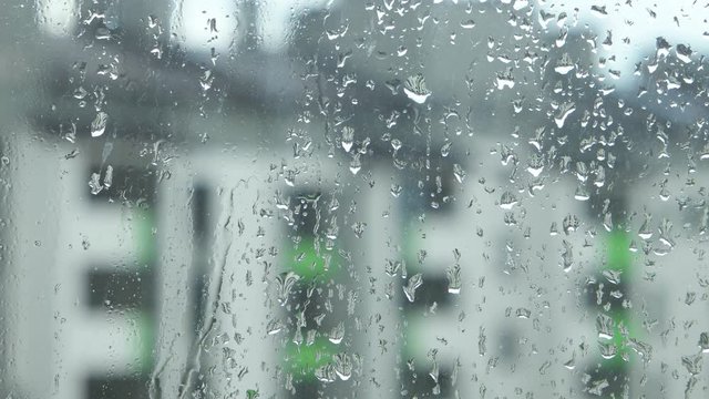 Windowpane during a heavy rain, a background