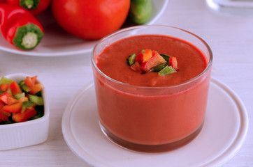Andalusian gazpacho, Spanish tomato soup made from made of raw blended vegetables and perfect for hot summer. Healthy raw food background