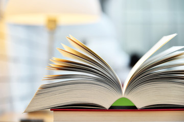 Books lying on the table in the public library