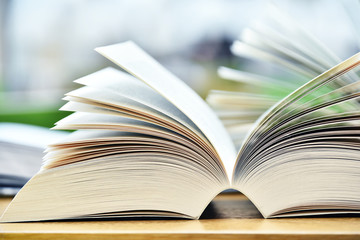 Books lying on the table in the public library