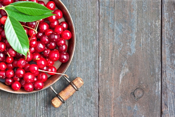  Cherries on wooden table. Fruit background