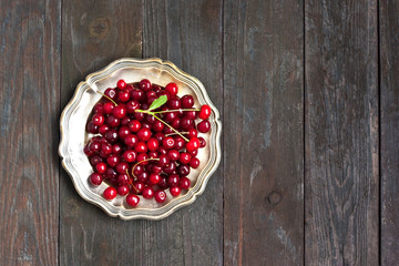 Fresh cherries on wooden table