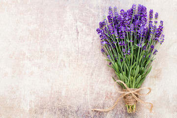 Lavender flowers, bouquet on rustic background, overhead. © gitusik