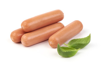 Fresh boiled sausages with herbs isolated on white background. Close-up.