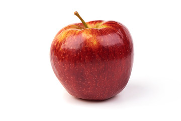 Fresh juicy red apple isolated on white background. Close-up.