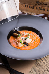 Orange chowder soup with shrimps