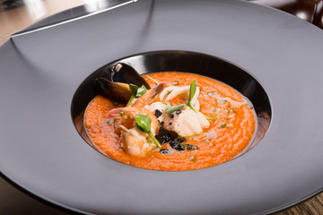 Orange chowder soup with shrimps