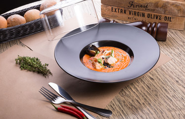 Orange chowder soup with shrimps