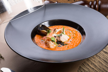 Orange chowder soup with shrimps