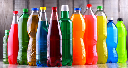 Plastic bottles of assorted carbonated soft drinks