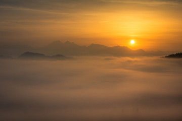 Fototapeta na wymiar Foggy morning in Alps near Skofja Loka, Slovenia
