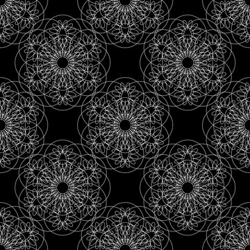 Flower mandala. Linear Graphics. Seamless pattern. Black background. Small items