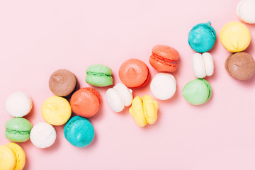 Fototapeta na wymiar Group of sweet colorful mini macarons