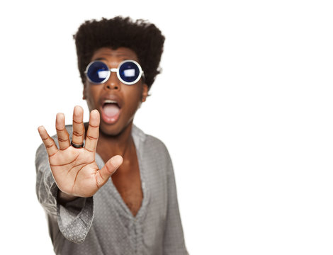 young handsome afro american guy stylish hipster shouting scared isolated on white background. people emotions concept