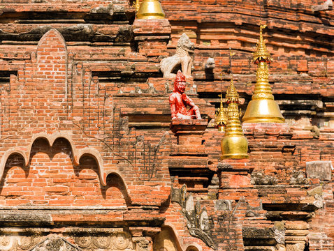 View of the bas-relief on the ancient pagoda in Bagan, Myanmar. Close-up.