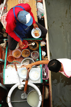 Floating market in Thailand selling paste of noodle