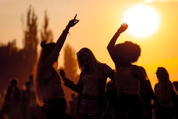 Poster Sunset party dancers silhouettes at summer music festival © leszekglasner