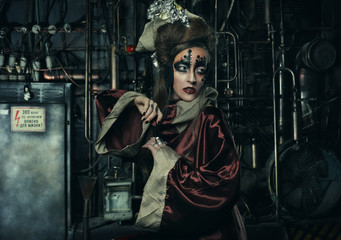Obraz na płótnie Canvas Aggressive stylish steampunk lady in a creative interior. Art an fashion concept.