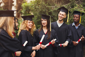 Group of multiethnic students on graduation day