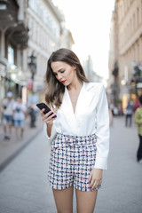 Fashion girl writing a message