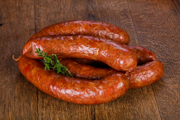 Pork sausages over wooden