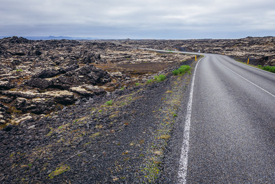 Lava field next to route number 425 along North Atlantic Ocean shore at Reykjanes Peninsula in Iceland