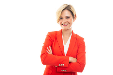 Young pretty business woman standing with arms crossed.