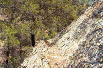 Hiking on Gavdos. Coastal trail to Kap Tripiti, the southernmost point of Europe