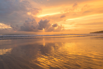 Obraz premium sunset on the beach in Asia