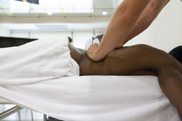 physiotherapist applying massage