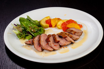 Tasty fried duck breast