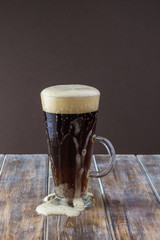 Glass of dark beer.