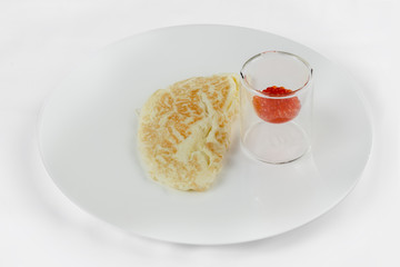 Omelette with red caviar.