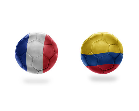 football balls with national flags of france and colombia.