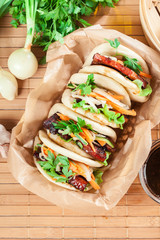 Gua bao, steamed buns with pork belly and vegetable