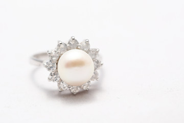 Pearl on diamond ring