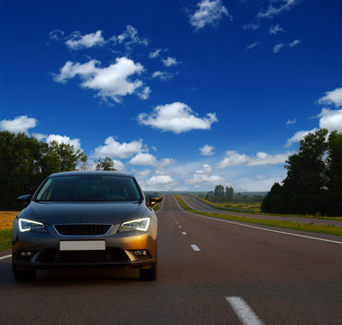 Fototapeta  car and on the road