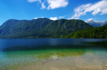 Naklejka na ściany i meble Mountain lake with clear water