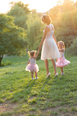 Fototapeta premium mom and two daughters