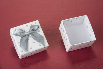 Small decorated box with bow for jewelry