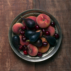 Fruits on the dark wooden table. Top view