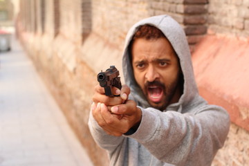 man holding a gun 