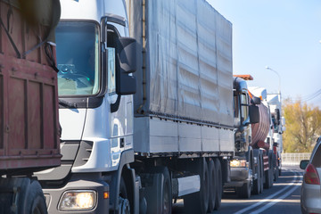 trucks in traffic jam on the road