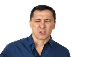     Disgusted man with unhappy face. The concept of disgust emotions