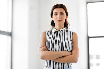 business, people and corporate concept - businesswoman at office