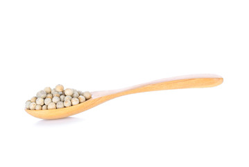 Pepper seed in wood spoon  on white background