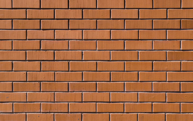 textured decorative orange brick wall. background, architecture.